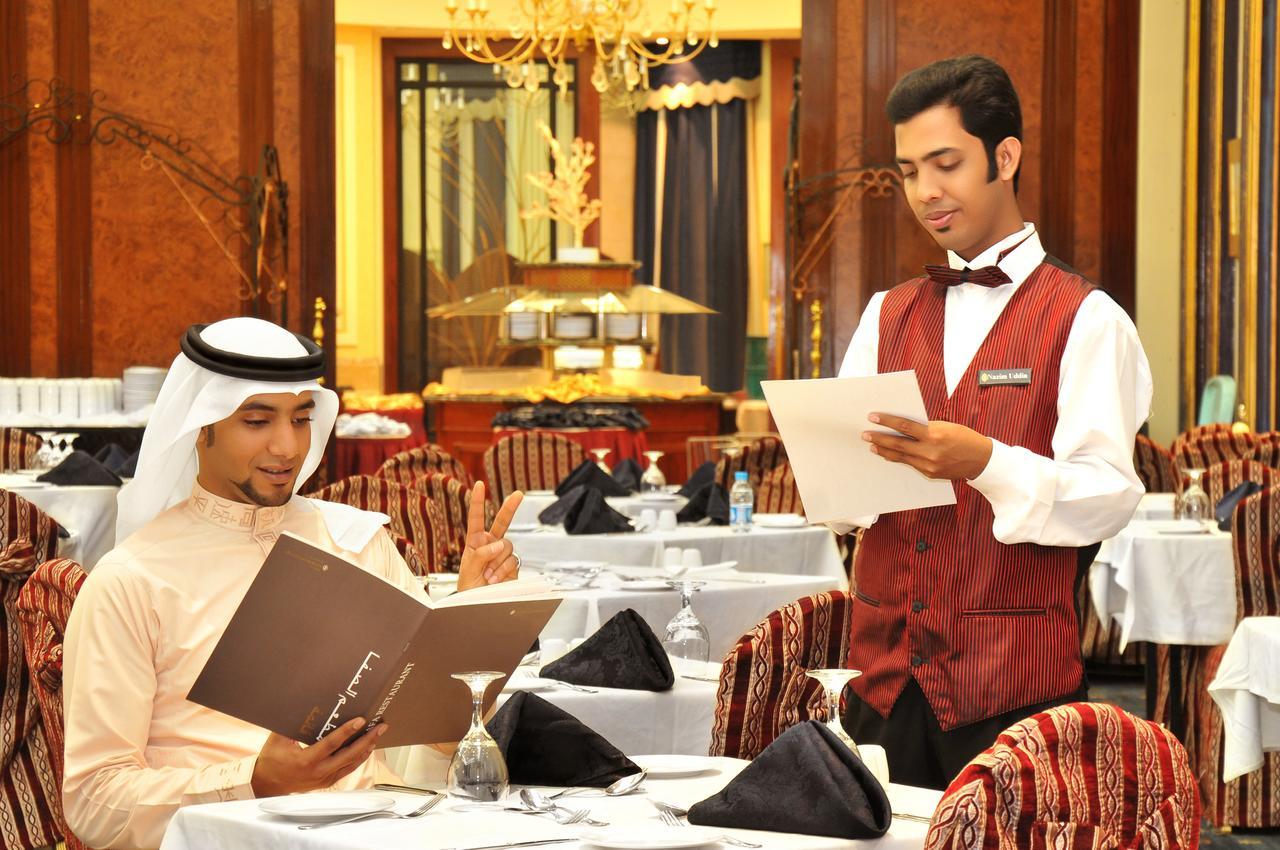 Intercontinental Dar Al Hijra Madinah, An Ihg Hotel Medina Exterior photo A waiter serving a guest