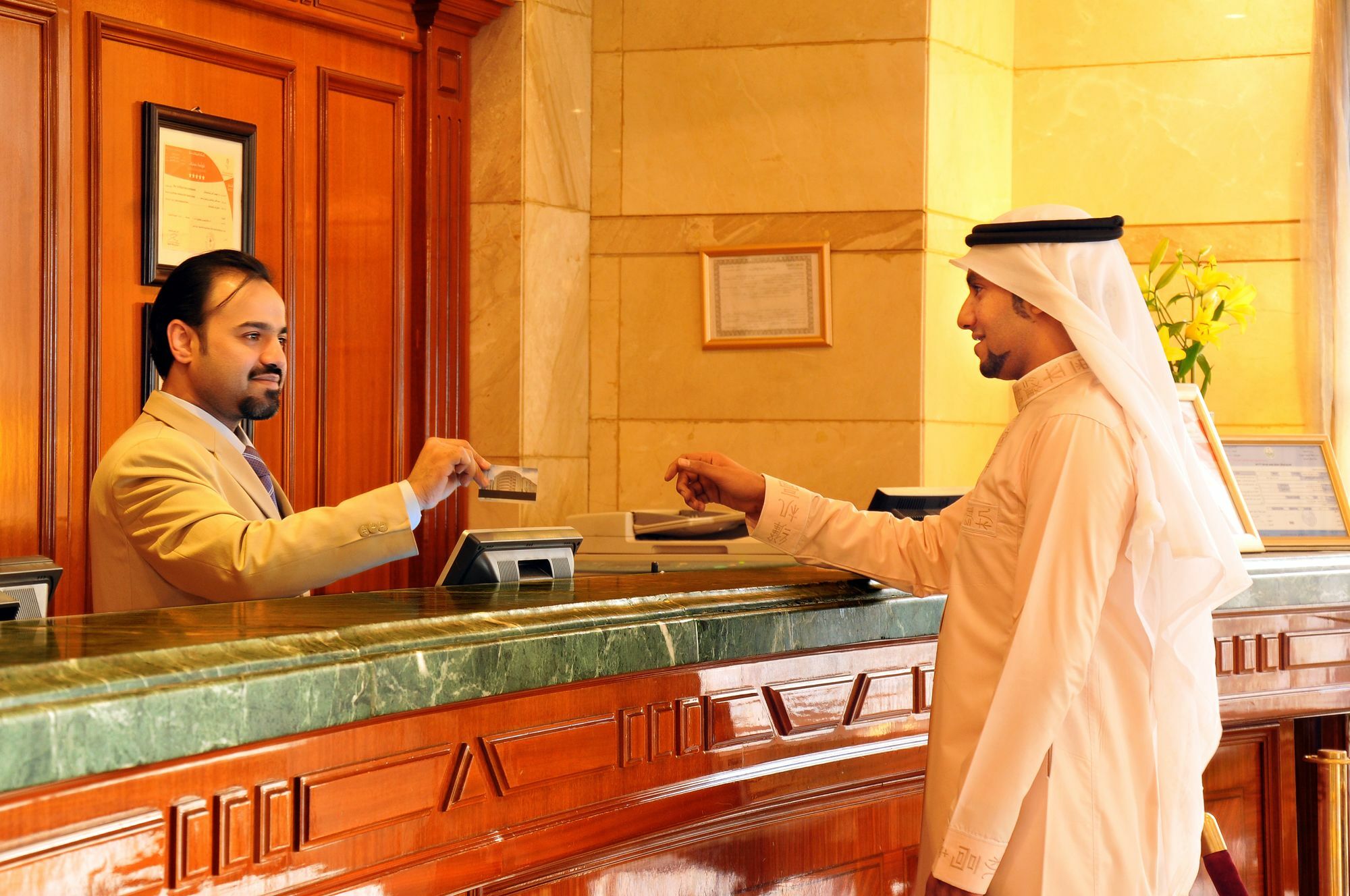 Intercontinental Dar Al Hijra Madinah, An Ihg Hotel Medina Exterior photo A hotel clerk at work